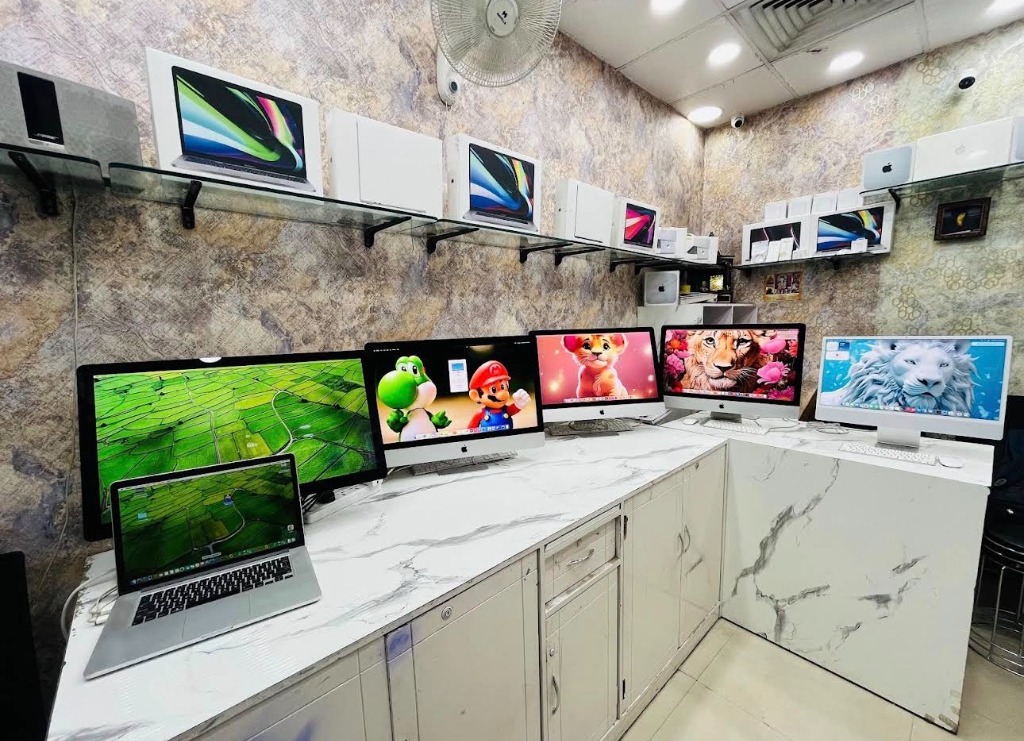 Laptops displayed on wooden table